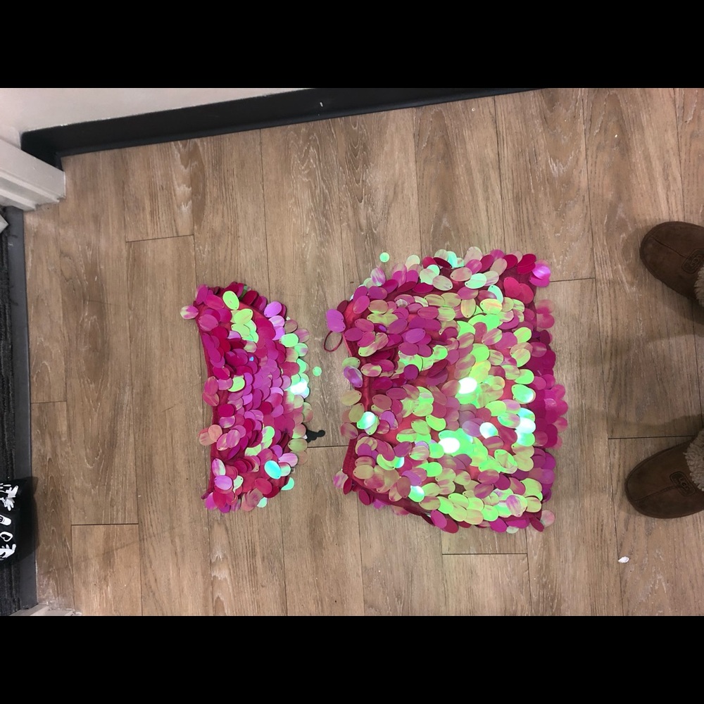 A sequin set that cross ties in the back
